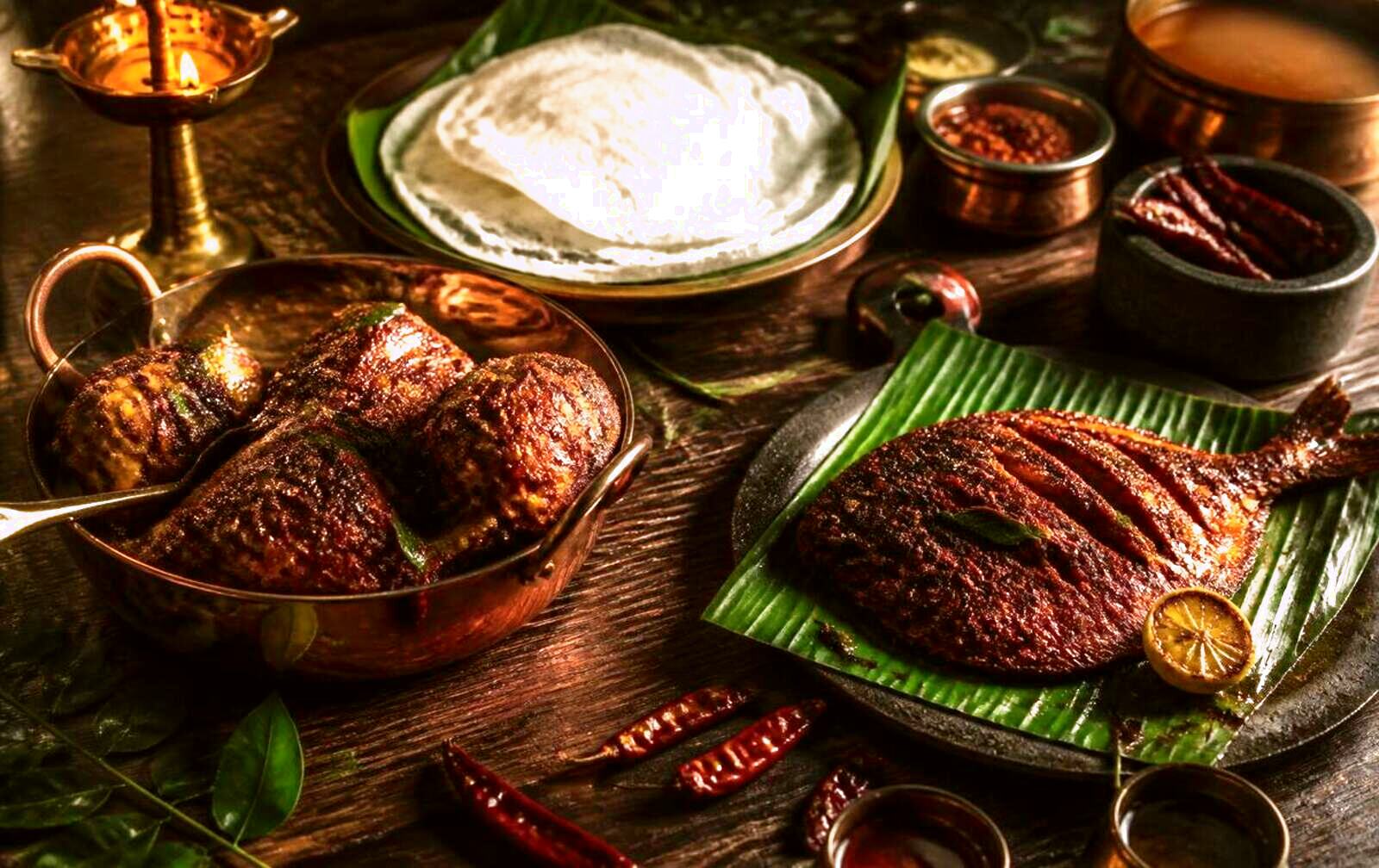 Coastal Karnataka seafood spread with ghee roast, tawa fried fish and neer dosa at Shalas